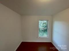 1141 6th Street Lancaster, SC 29720 - Photo 14 of 18 a view of a small space with wooden floor and a window