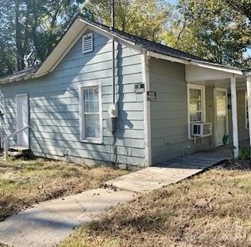 1141 6th Street Lancaster, SC 29720 - Photo 3 of 18 a front view of a house with a yard