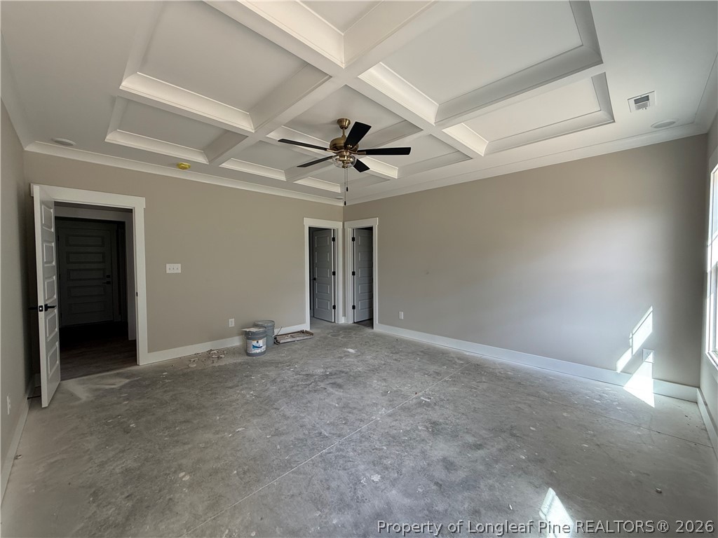 132 Ridge Stone Drive Autryville, NC 28318 - Photo 12 of 26 an empty room with ceiling fan and window