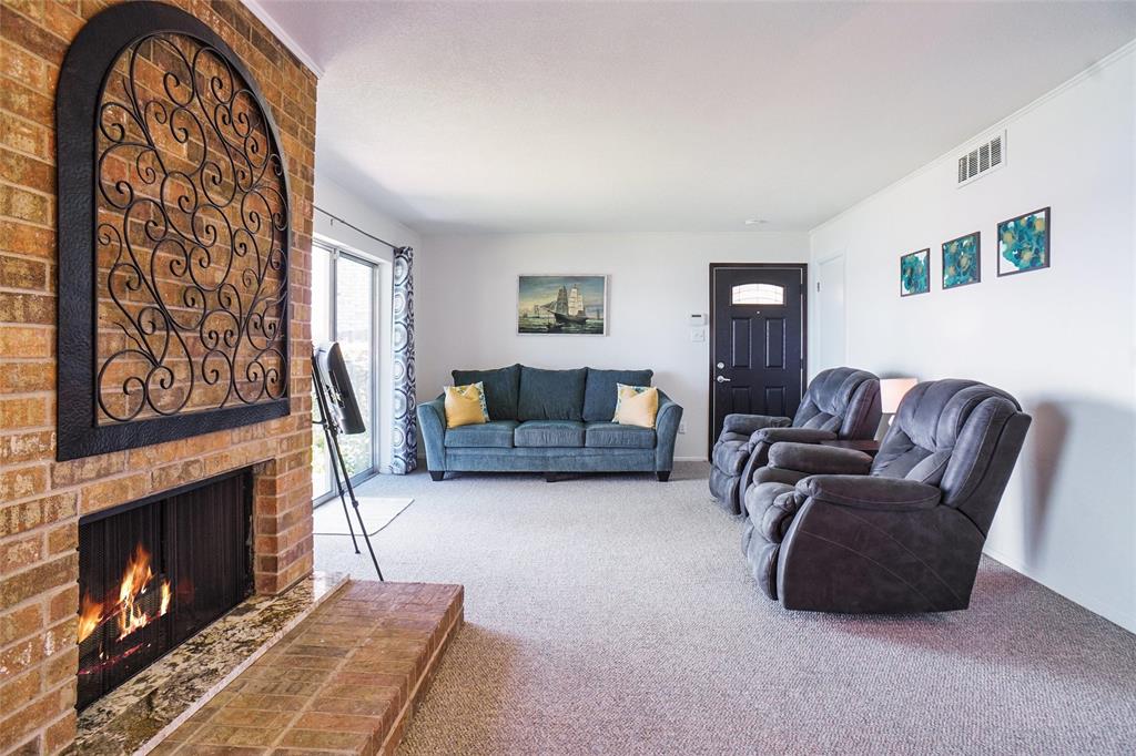 388 Driftwood Court, Unit 1A Azle, TX 76020 - Photo 8 of 29 Wood burning fireplace