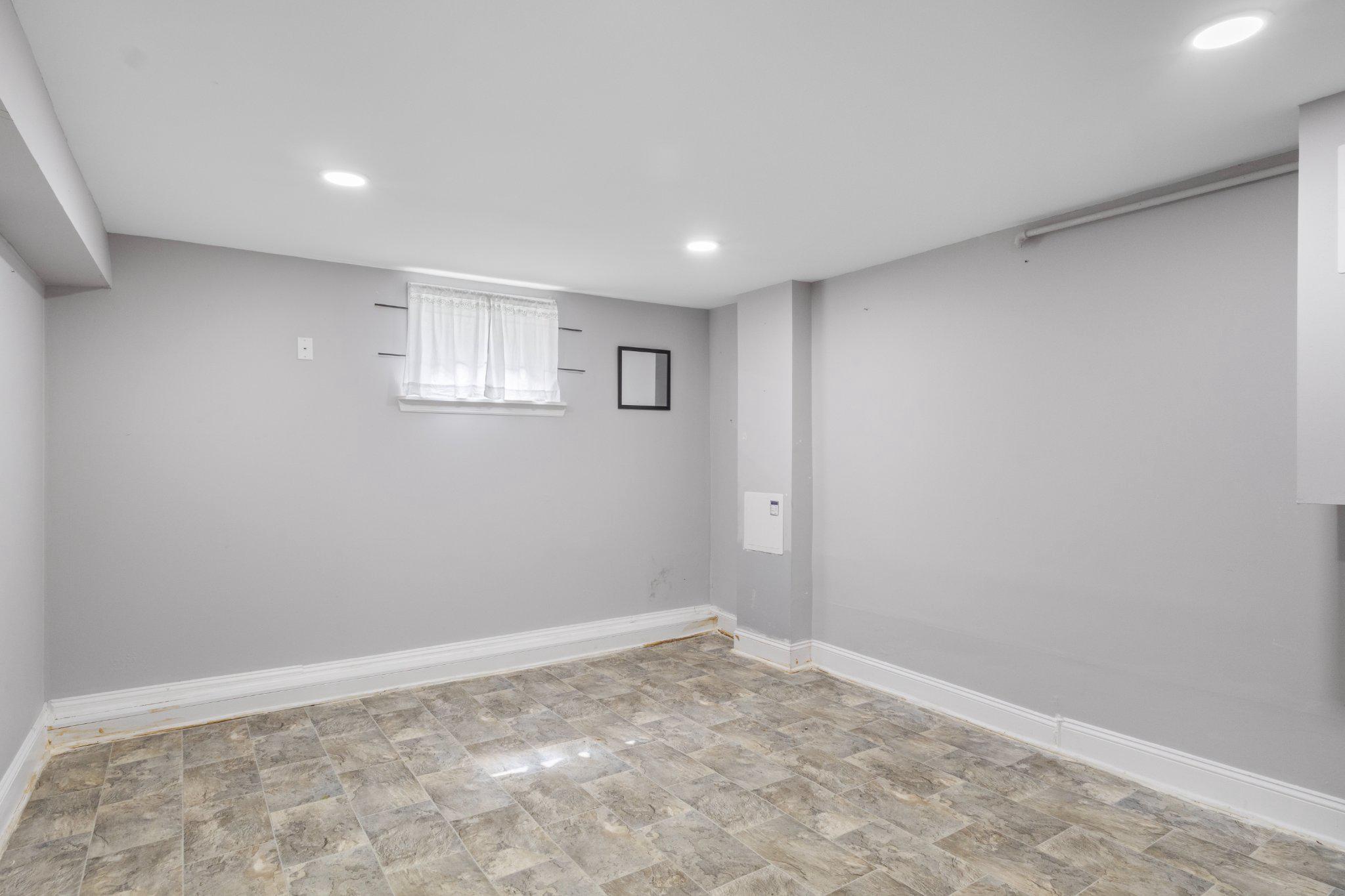 130 West Edgevale Road Baltimore, MD 21225 - Photo 26 of 37 Room in Basement ready for your vision.