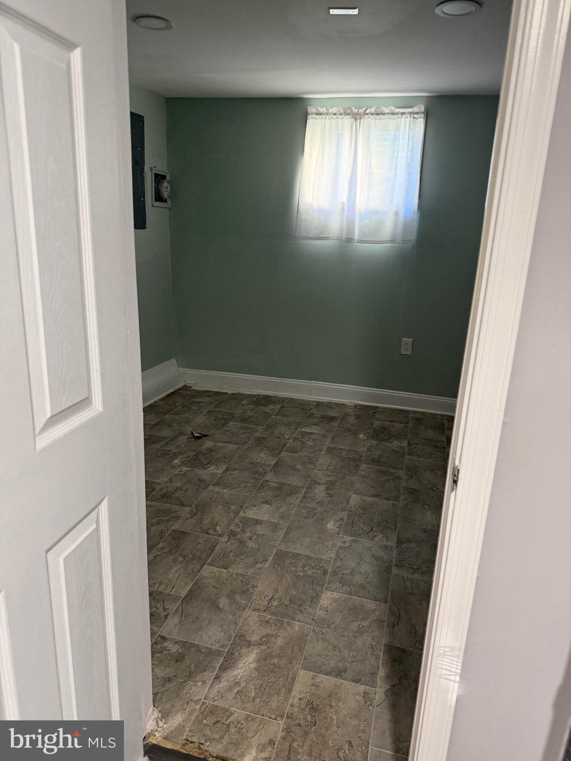 130 West Edgevale Road Baltimore, MD 21225 - Photo 8 of 37 view of room with window
