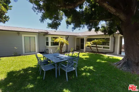 a view of a garden with a fountain