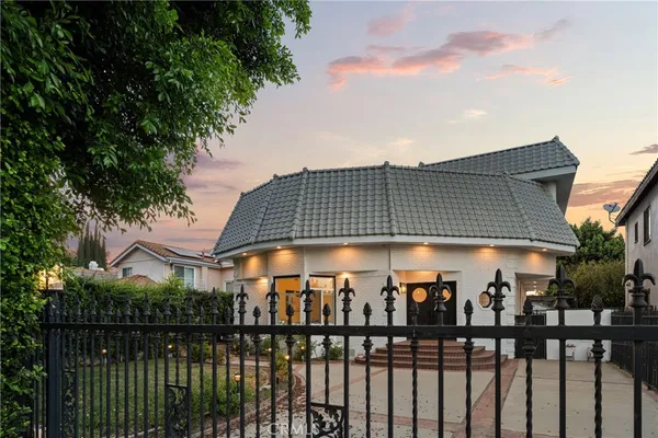 a front view of a house with a balcony