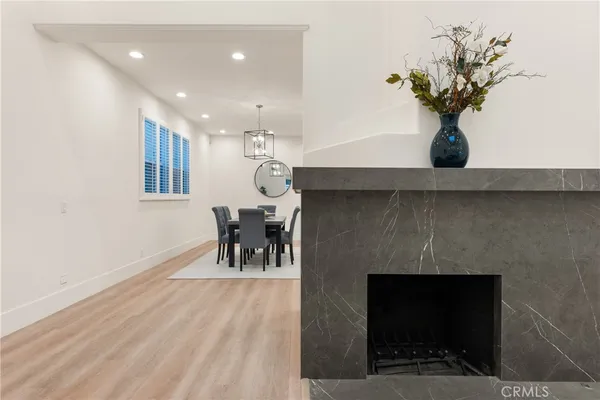 a view of dining room with furniture and wooden floor