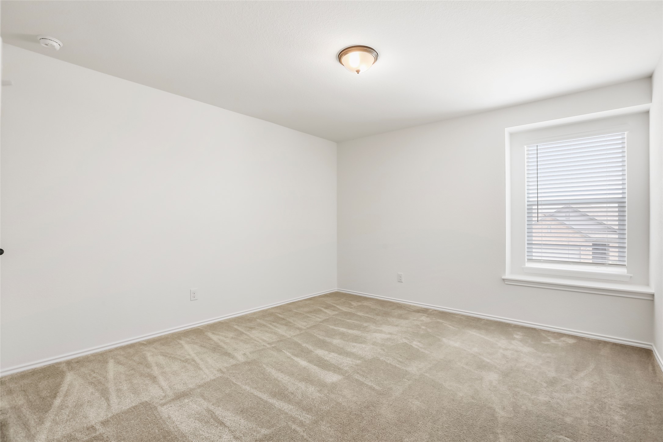 18917 Rushmore Street Manor, TX 78653 - Photo 23 of 28 an empty room with a window