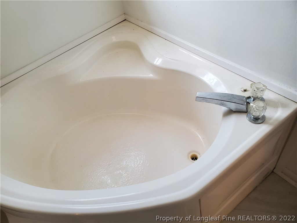 320 Ridge View Drive Cameron, NC 28326 - Photo 17 of 27 a bathroom with a tub