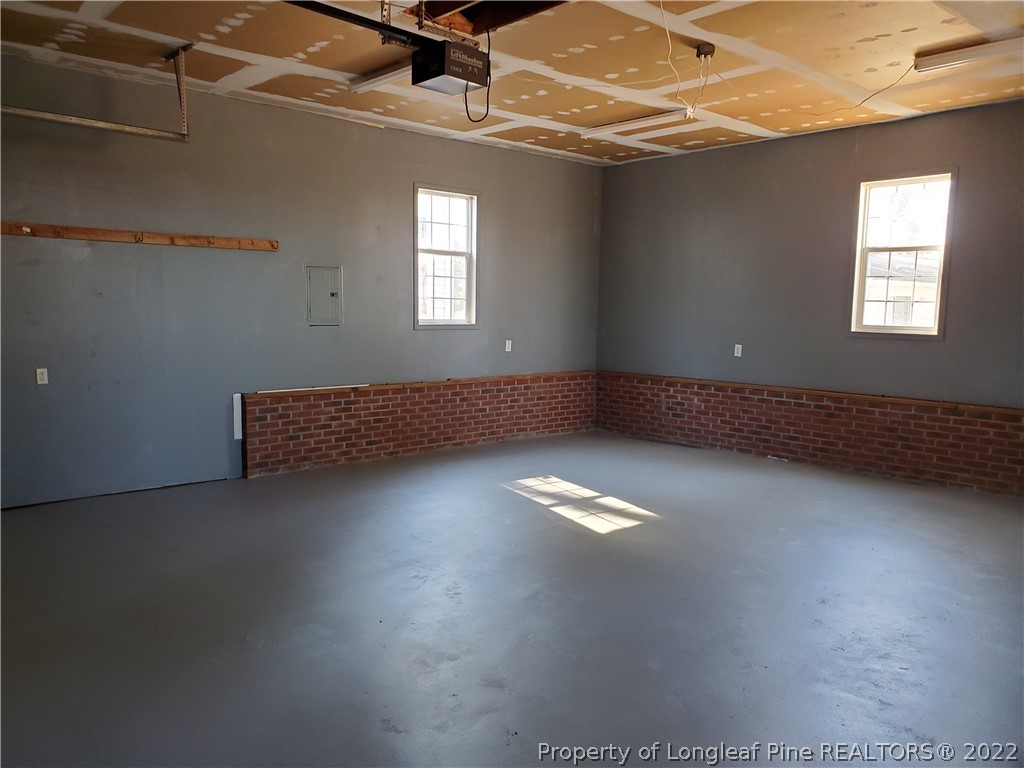 320 Ridge View Drive Cameron, NC 28326 - Photo 25 of 27 a view of empty room with windows