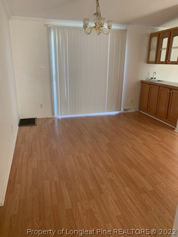 320 Ridge View Drive Cameron, NC 28326 - Photo 9 of 27 wooden floor in an empty room