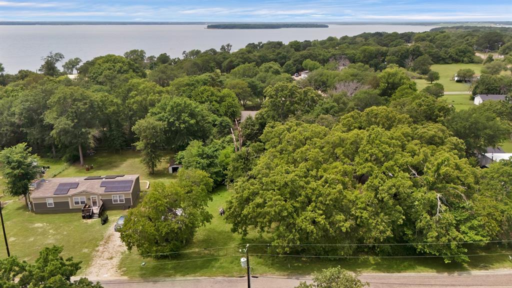 Tbd Cherry Blossom Kemp, TX 75143 - Photo 6 of 7 a aerial view of a house with a yard