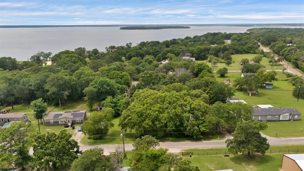 Tbd Cherry Blossom Kemp, TX 75143 - Photo 7 of 7 a view of a lake from a yard