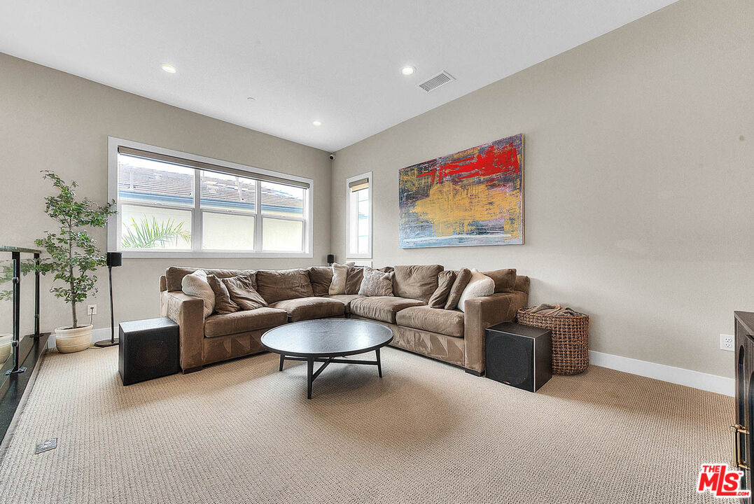 20558 Overlook Court Porter Ranch, CA 91326 - Photo 15 of 48 a living room with furniture and a large window