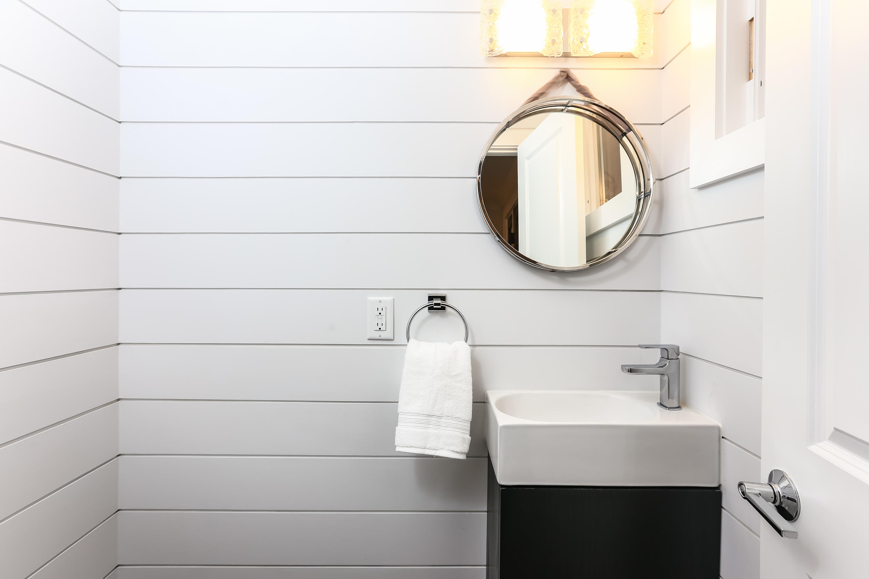 68 Relihan Road Darien, CT 06820 - Photo 14 of 27 a bathroom with a sink and a mirror
