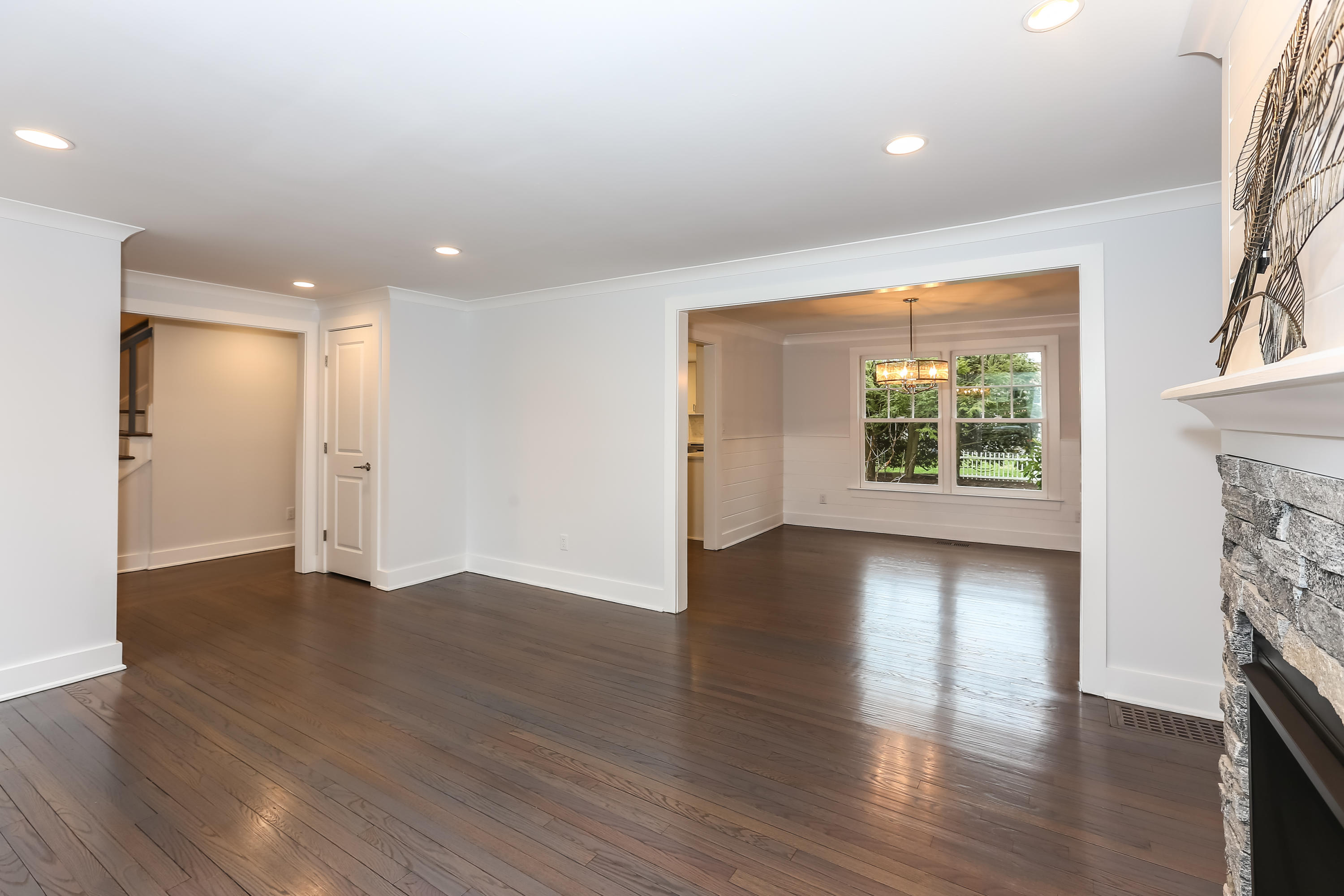 68 Relihan Road Darien, CT 06820 - Photo 5 of 27 an empty room with wooden floor and a window