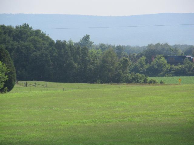 545 Tri Cities Farm Road Winchester, TN 37398 - Photo 12 of 14 Enjoy the view of the mountains from your front porch rockers