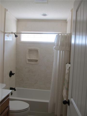 545 Tri Cities Farm Road Winchester, TN 37398 - Photo 6 of 14 Bedroom 3 and 2 share this ample sized bath, with combo tub and shower