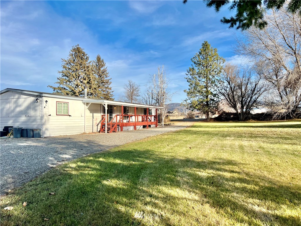 53 Woods Road Omak, WA 98841 - Photo 1 of 40 a view of a house with a yard
