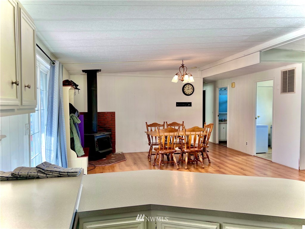 53 Woods Road Omak, WA 98841 - Photo 17 of 40 a dining room with furniture and window