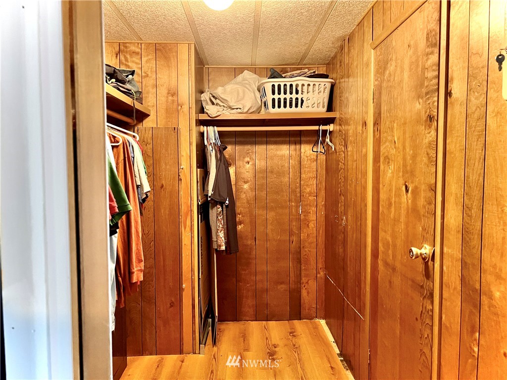 53 Woods Road Omak, WA 98841 - Photo 23 of 40 a view of a hallway with wooden door