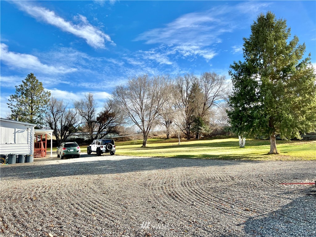 53 Woods Road Omak, WA 98841 - Photo 30 of 40 a view of a park with large trees