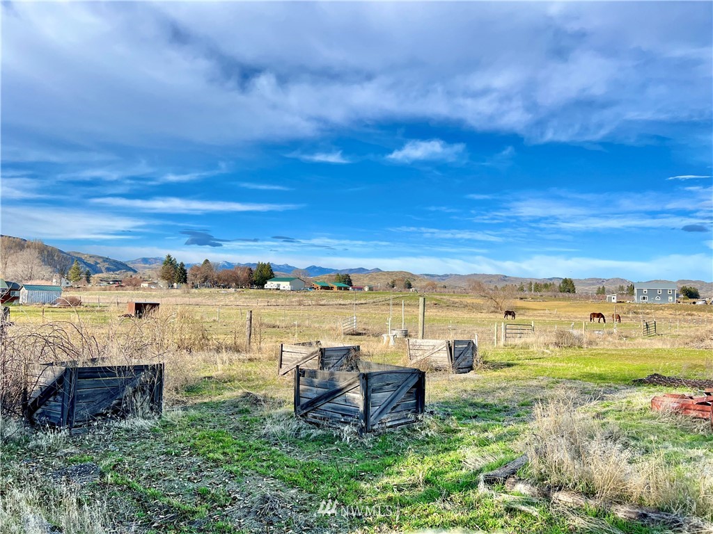 53 Woods Road Omak, WA 98841 - Photo 35 of 40 a view of a lake with outdoor space