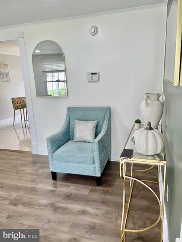 a kitchen with stainless steel appliances a stove microwave and sink