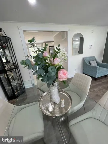 a room with a dresser and a mirror