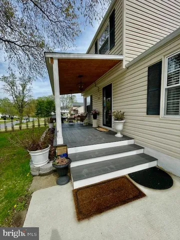 a outdoor living space with furniture and garden view