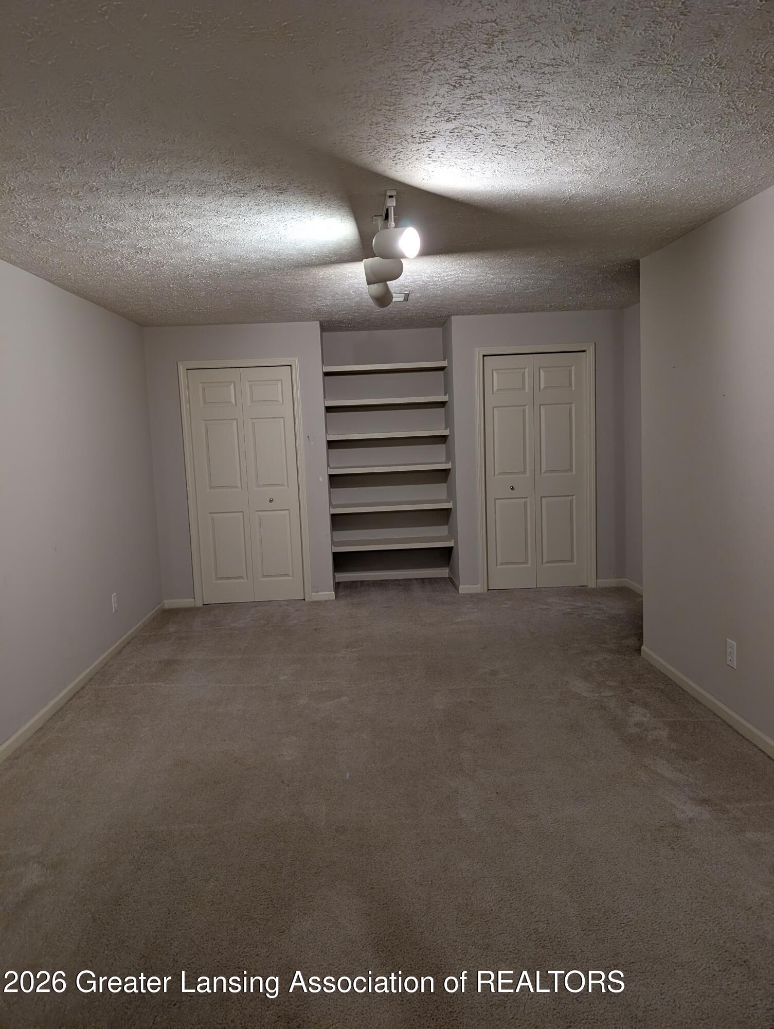 2415 North Aurelius Road, Unit 14 Holt, MI 48842 - Photo 18 of 29 Family room