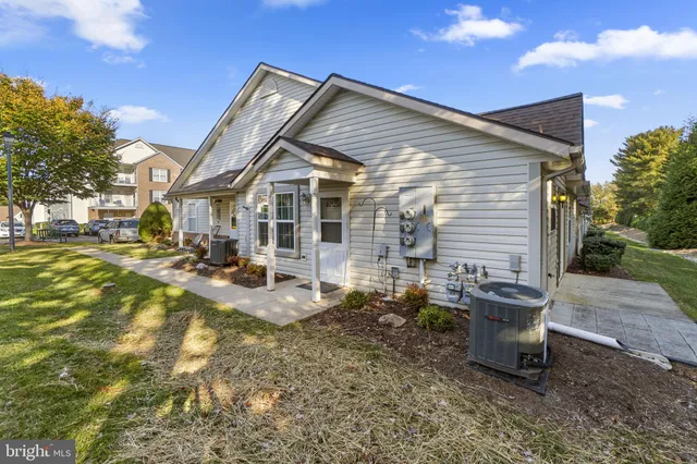 a view of backyard with green space