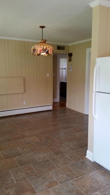 403 Shue Road China Grove, NC 28023 - Photo 12 of 15 a view of a kitchen with a refrigerator a kitchen a sink a refrigerator a cabinet and a refrigerator