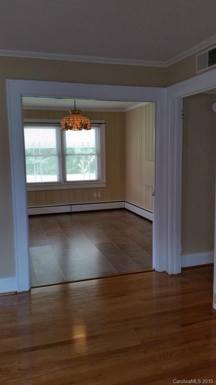 403 Shue Road China Grove, NC 28023 - Photo 9 of 15 a view of empty room with wooden floor and fan