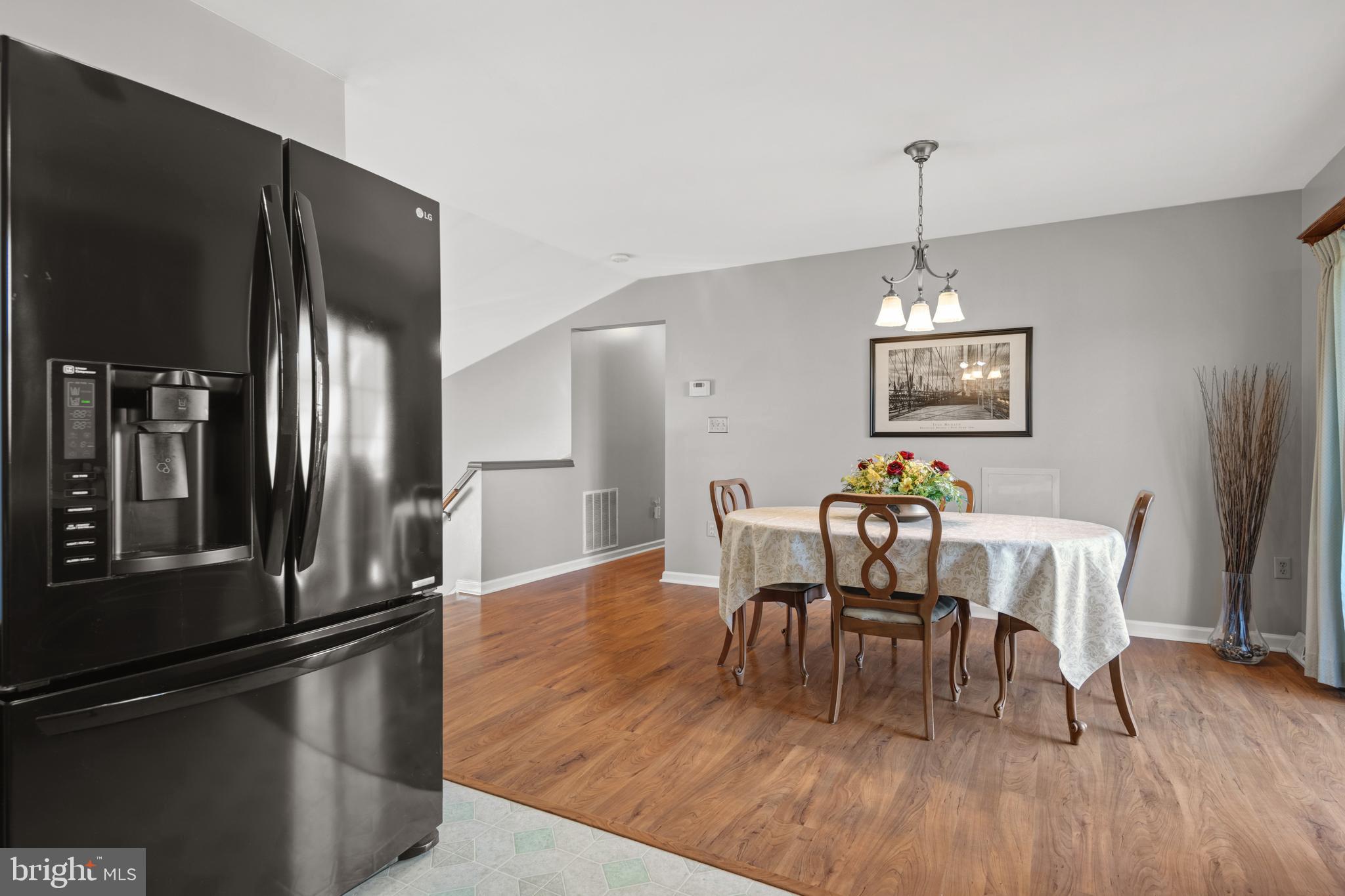 16 Pebble Creek Drive Lititz, PA 17543 - Photo 12 of 37 a view of a dining room with furniture window and wooden floor