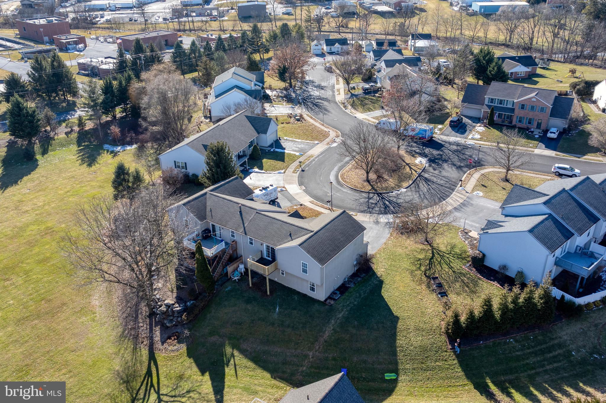 16 Pebble Creek Drive Lititz, PA 17543 - Photo 34 of 37 an aerial view of a house with garden space and street view
