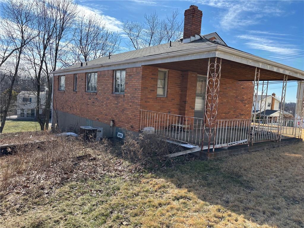 1800 McCully Road Pittsburgh, PA 15234 - Photo 11 of 12 a view of a house with a yard