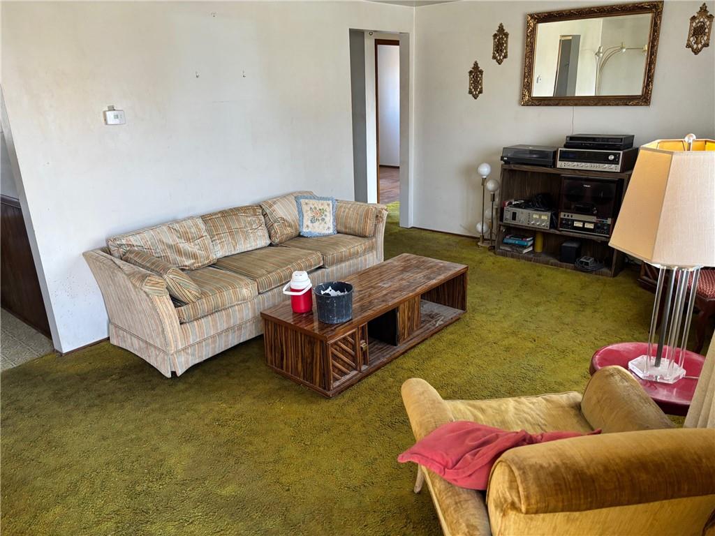 1800 McCully Road Pittsburgh, PA 15234 - Photo 2 of 12 a living room with furniture and a piano