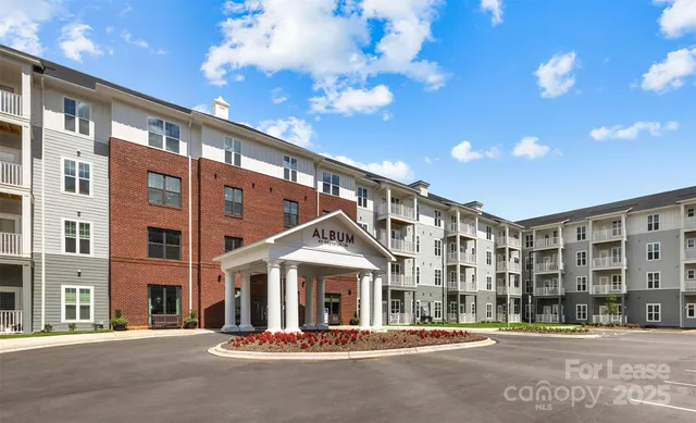 a view of a building and a street