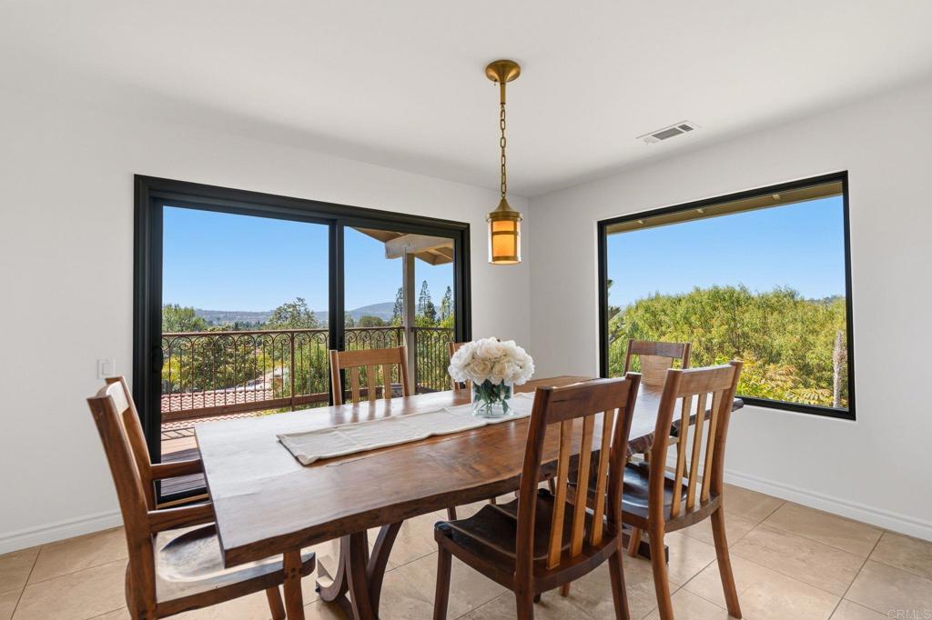 13319 Pacer Lane Poway, CA 92064 - Photo 15 of 75 a view of a dining room with furniture window and outside view