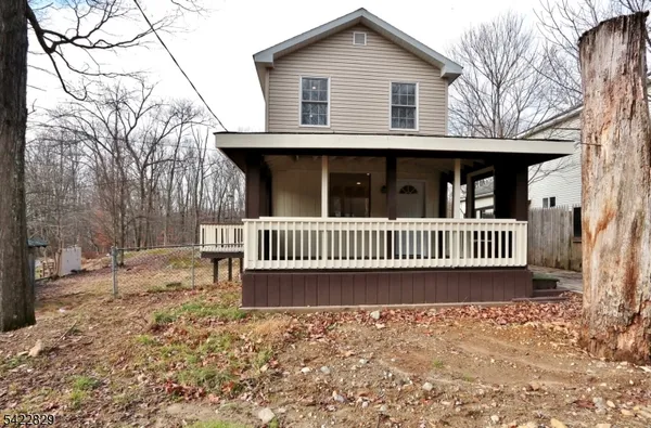 a view of a house with a roof deck