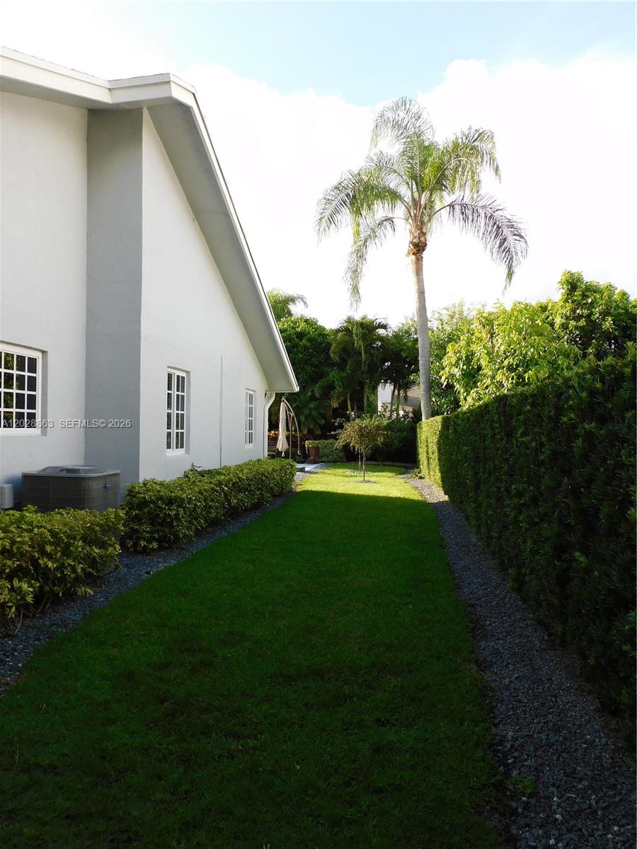 15351 Southwest 146th Street Miami, FL 33196 - Photo 72 of 86 East side patio area.