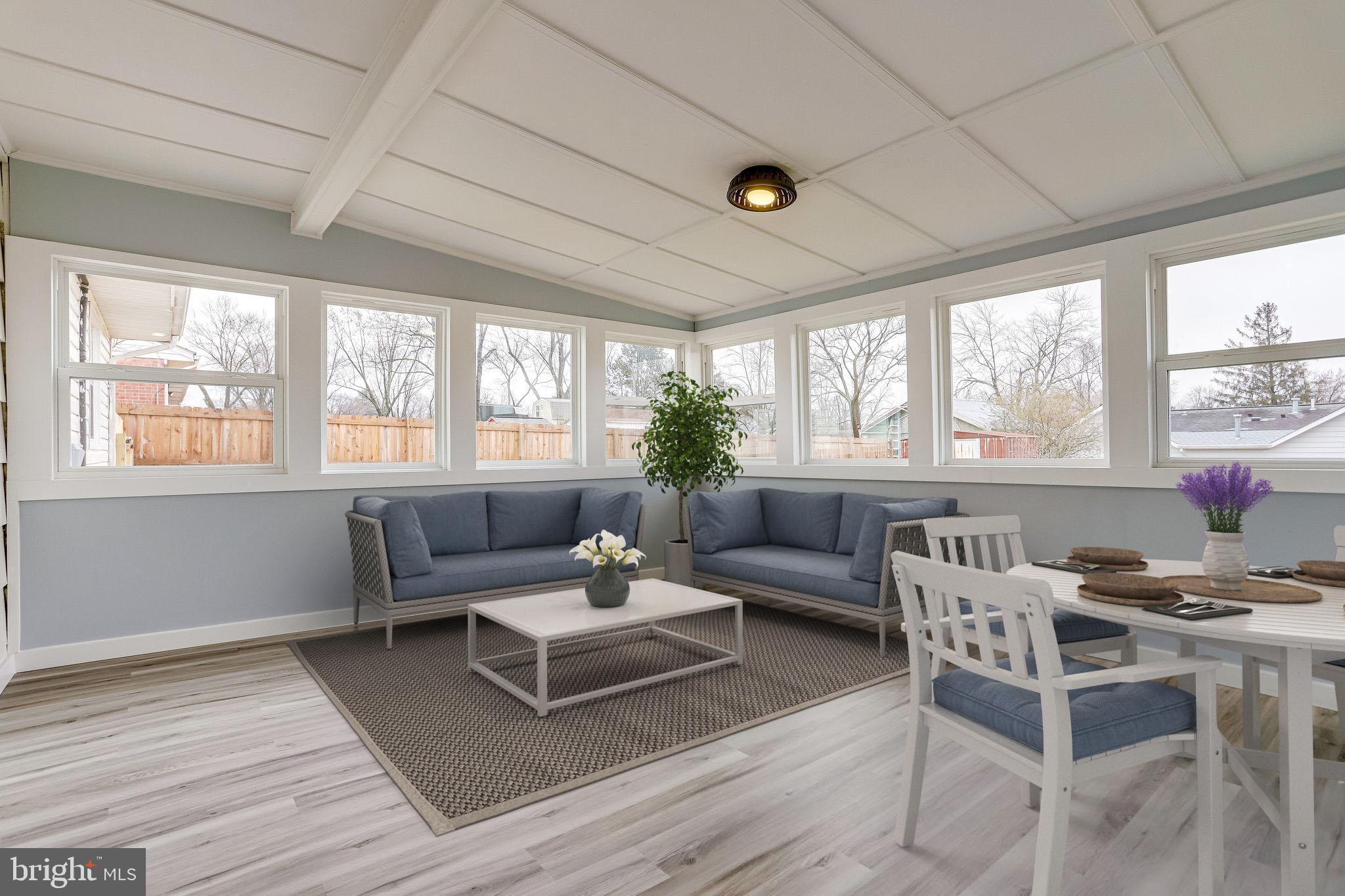 221 West Ash Road Sterling, VA 20164 - Photo 11 of 28 Virtually Staged - Sunroom