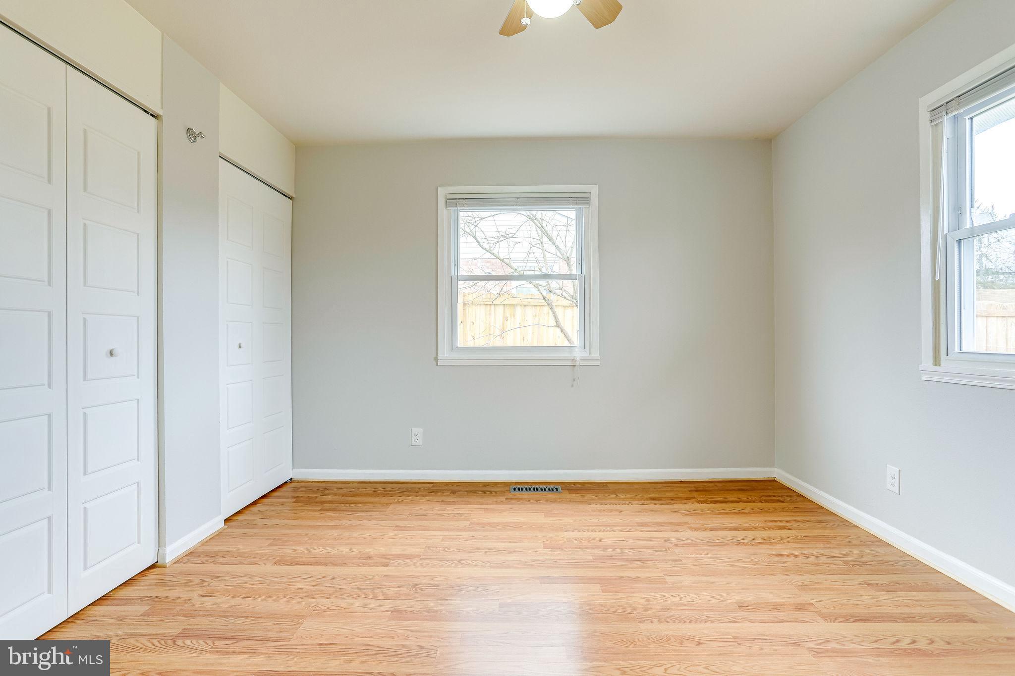 221 West Ash Road Sterling, VA 20164 - Photo 15 of 28 Primary Bedroom w/ His & Her Closets