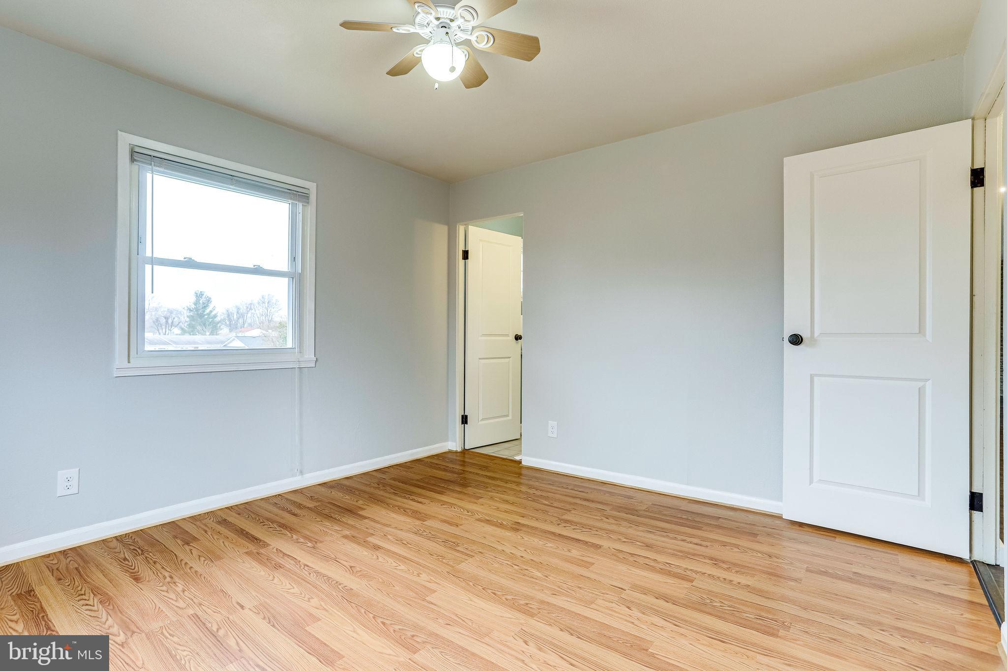 221 West Ash Road Sterling, VA 20164 - Photo 16 of 28 Primary Bedroom w/ His & Her Closets