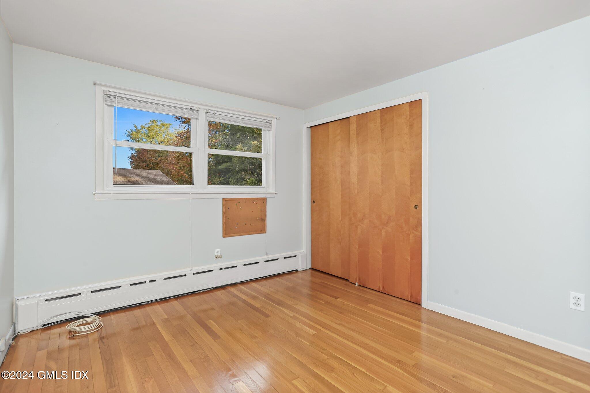 20 Norias Road Greenwich, CT 06830 - Photo 19 of 40 an empty room with a window