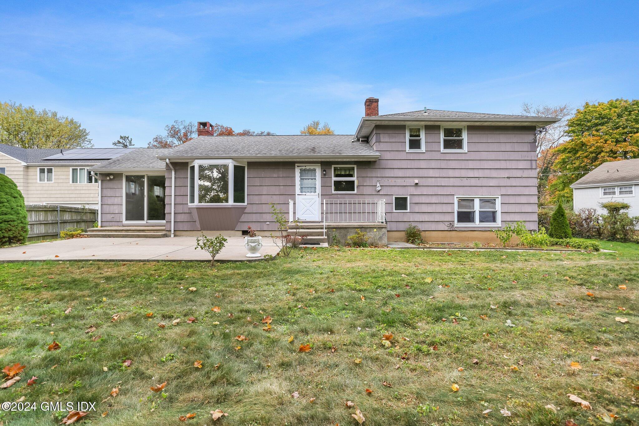 20 Norias Road Greenwich, CT 06830 - Photo 2 of 40 a front view of a house with a yard