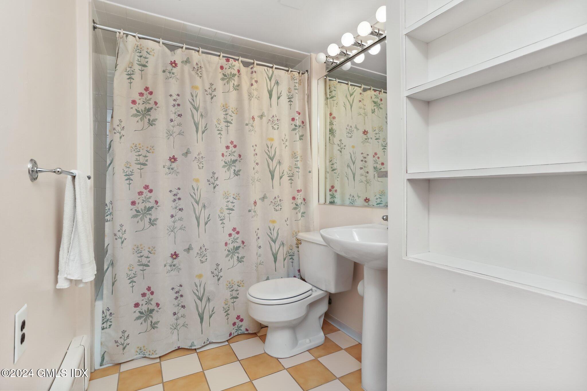 20 Norias Road Greenwich, CT 06830 - Photo 27 of 40 a bathroom with a toilet and a shower