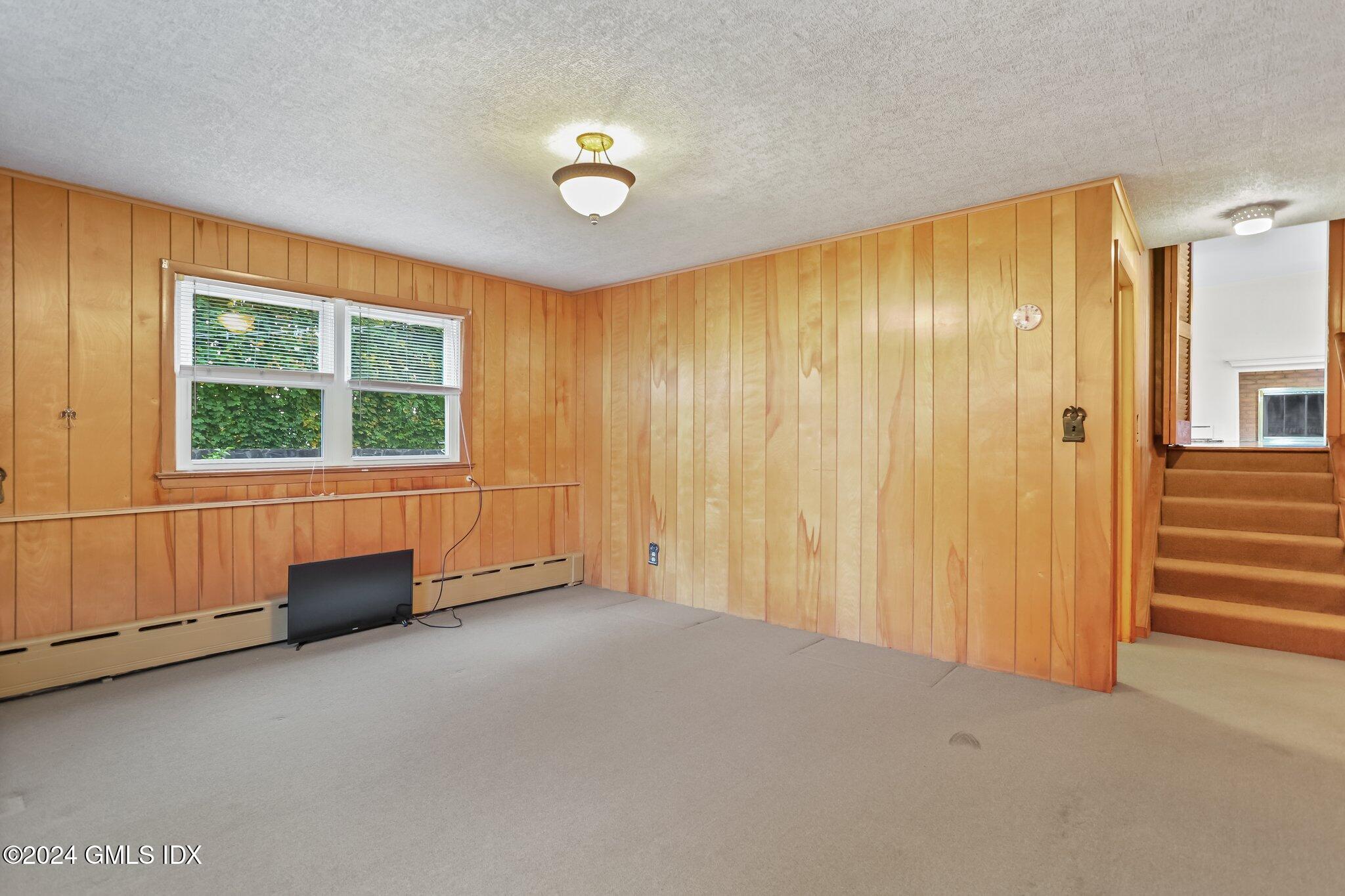 20 Norias Road Greenwich, CT 06830 - Photo 29 of 40 an empty room with windows