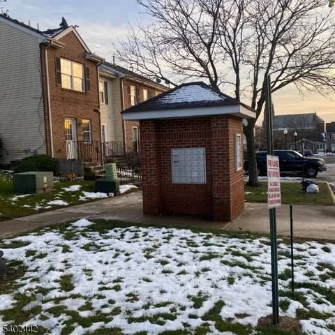 a kitchen with a sink cabinets and window