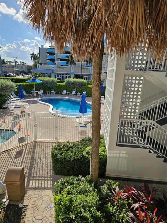 120 Northeast 20th Avenue, Unit 3 Deerfield Beach, FL 33441 - Photo 10 of 14 a view of a garden