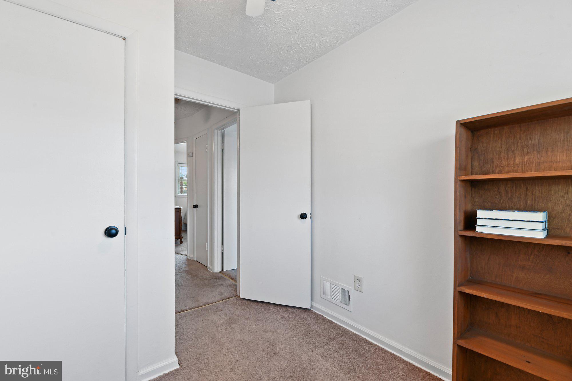 817 Lannerton Road Baltimore, MD 21220 - Photo 11 of 18 3rd bedroom looking towards hall